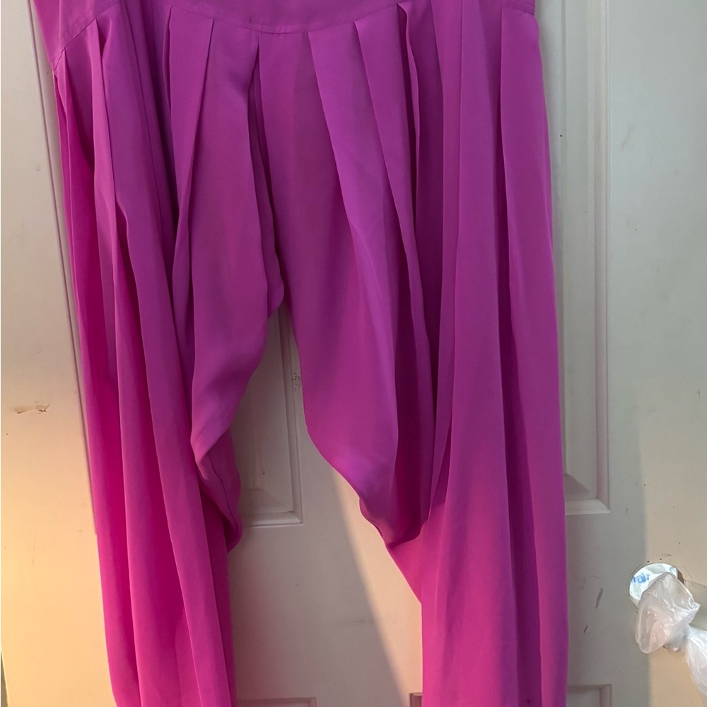 Adorable pair of fuchsia patiala salwar pants with embroidered cuffs.